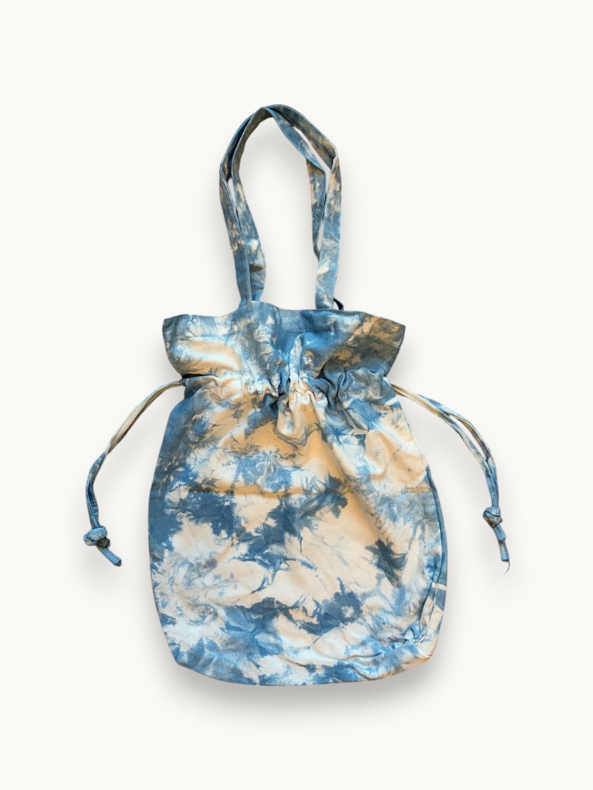 Cinched indigo drawstring pouch